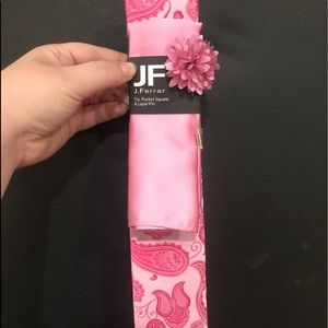 Tie, pocket square, and pin